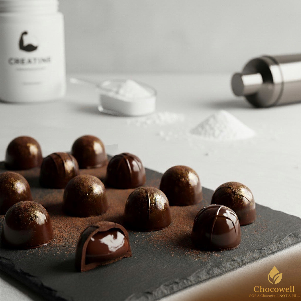 Chocolate truffles on a slate board with a container labeled 'Creatine' in the background.